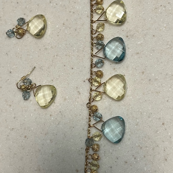 Earrings and necklace matching set. Clear blue & lime gems with gold-tone metal. - Picture 3 of 7